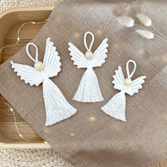 Crochet angel pattern Freja with Scandinavian-inspired handmade Christmas decor and textured ornament details.