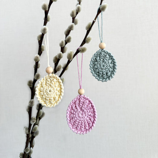 Crochet Easter egg decoration pattern with Scandinavian-inspired handmade spring decor and textured details.