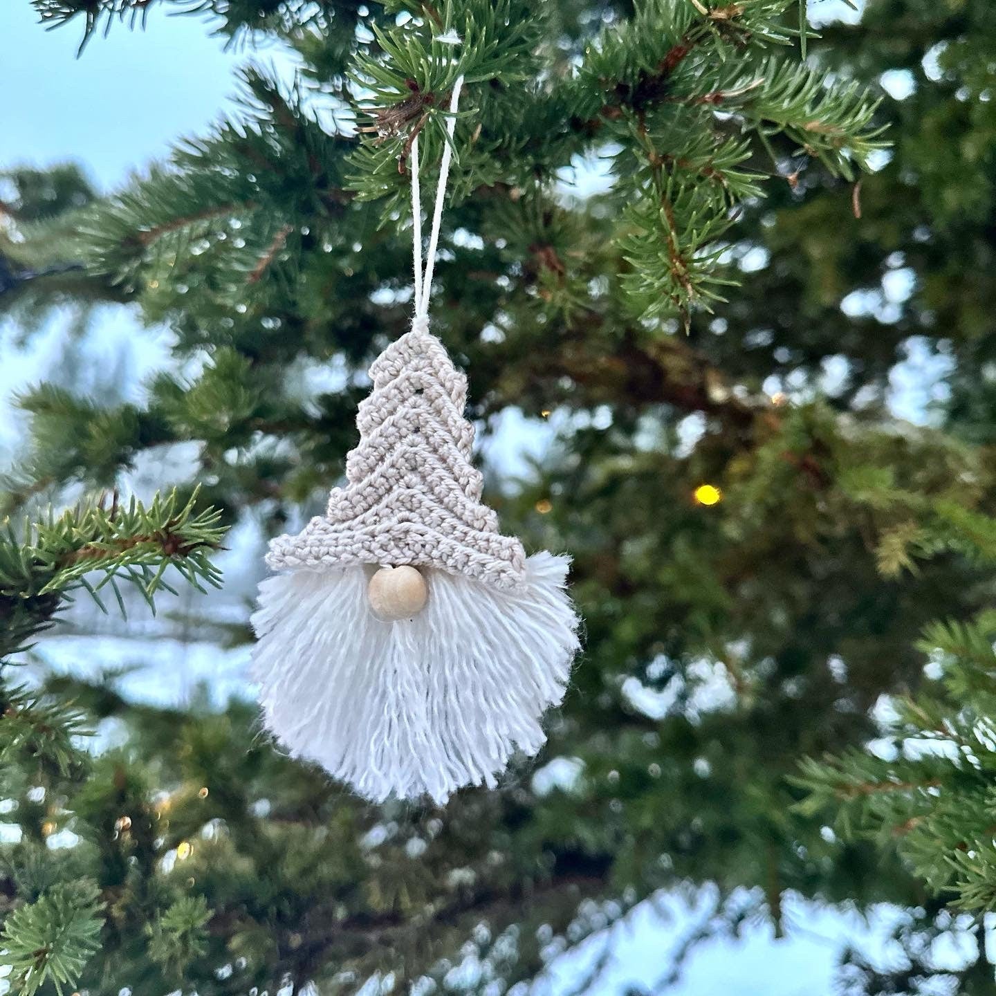 Crochet gnome ornament pattern designed for handmade Christmas decorations and festive home decor.