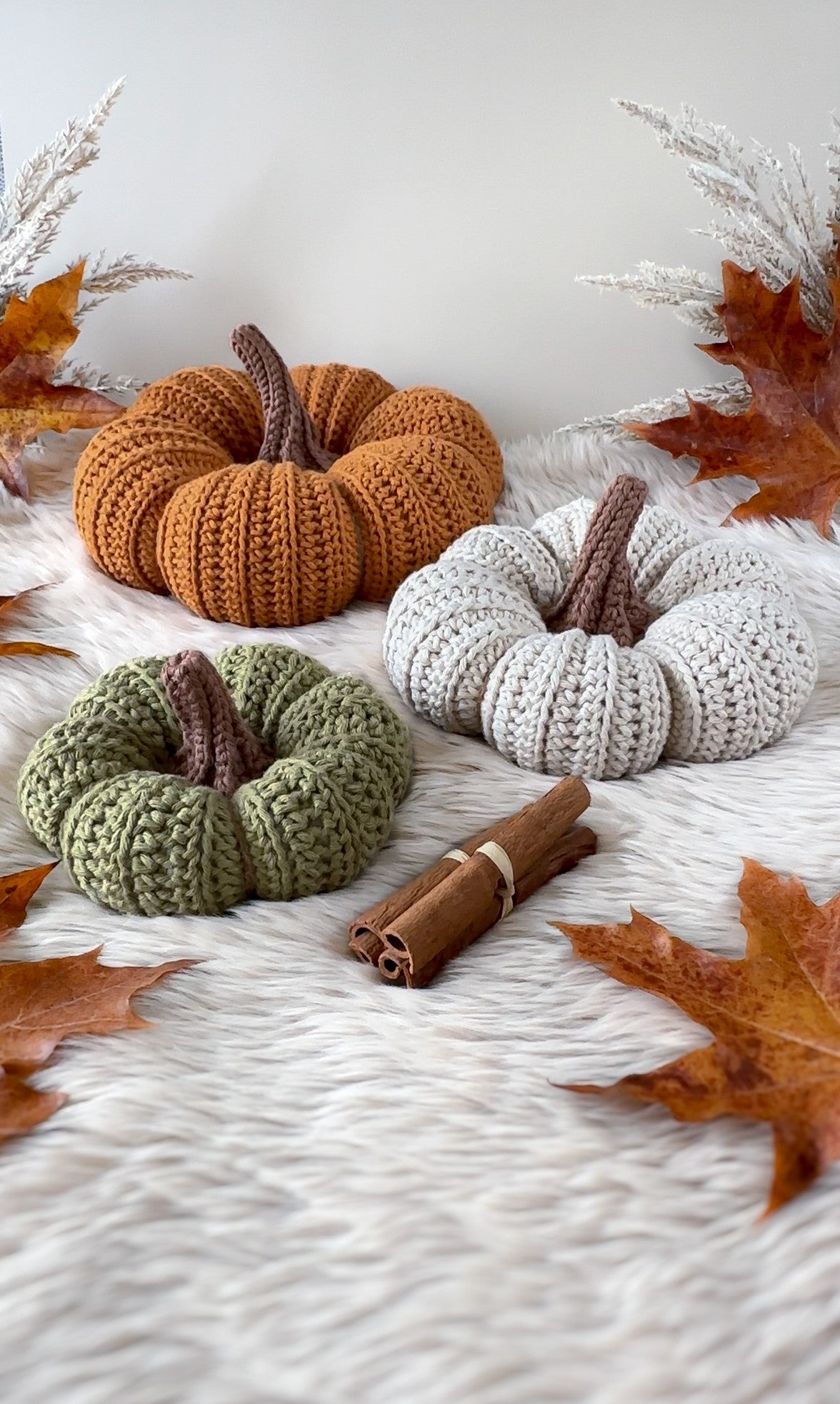 Crochet Halloween pumpkin pattern with cozy autumn styling and handmade seasonal decor.