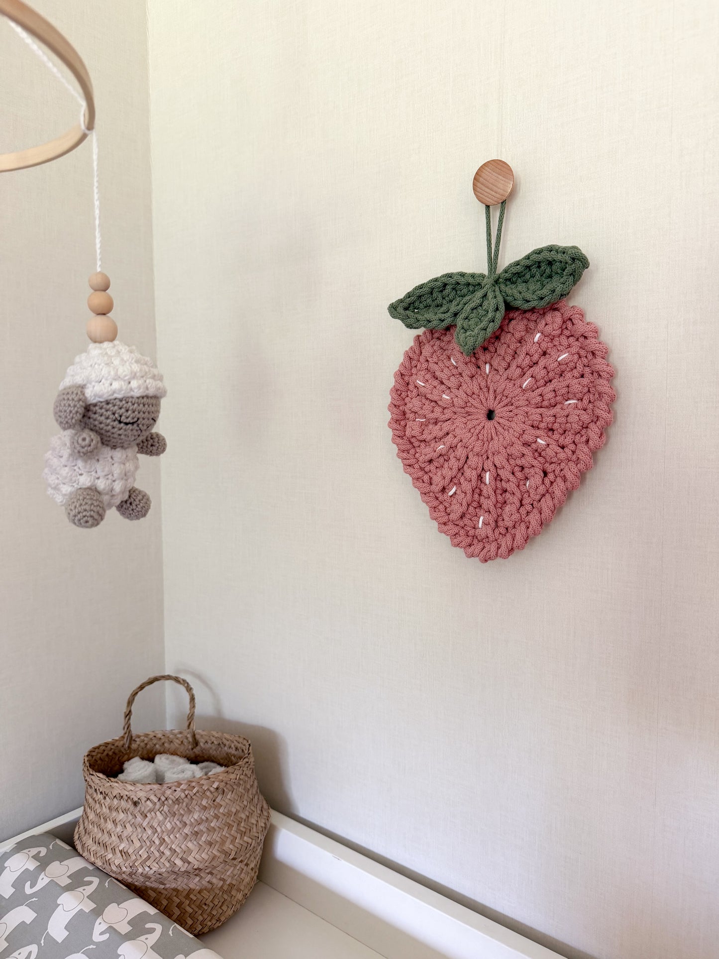 Crochet strawberry wall decor pattern for a nursery or kids room