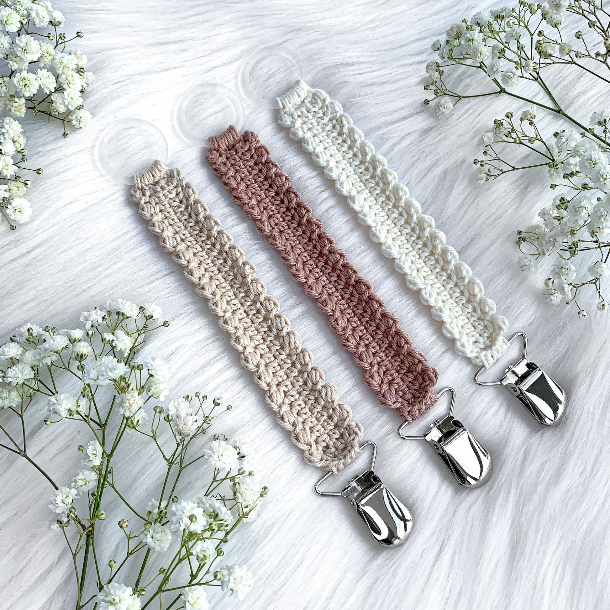 Crochet pacifier clip pattern Vera with soft Scandinavian-inspired baby styling and handmade details.