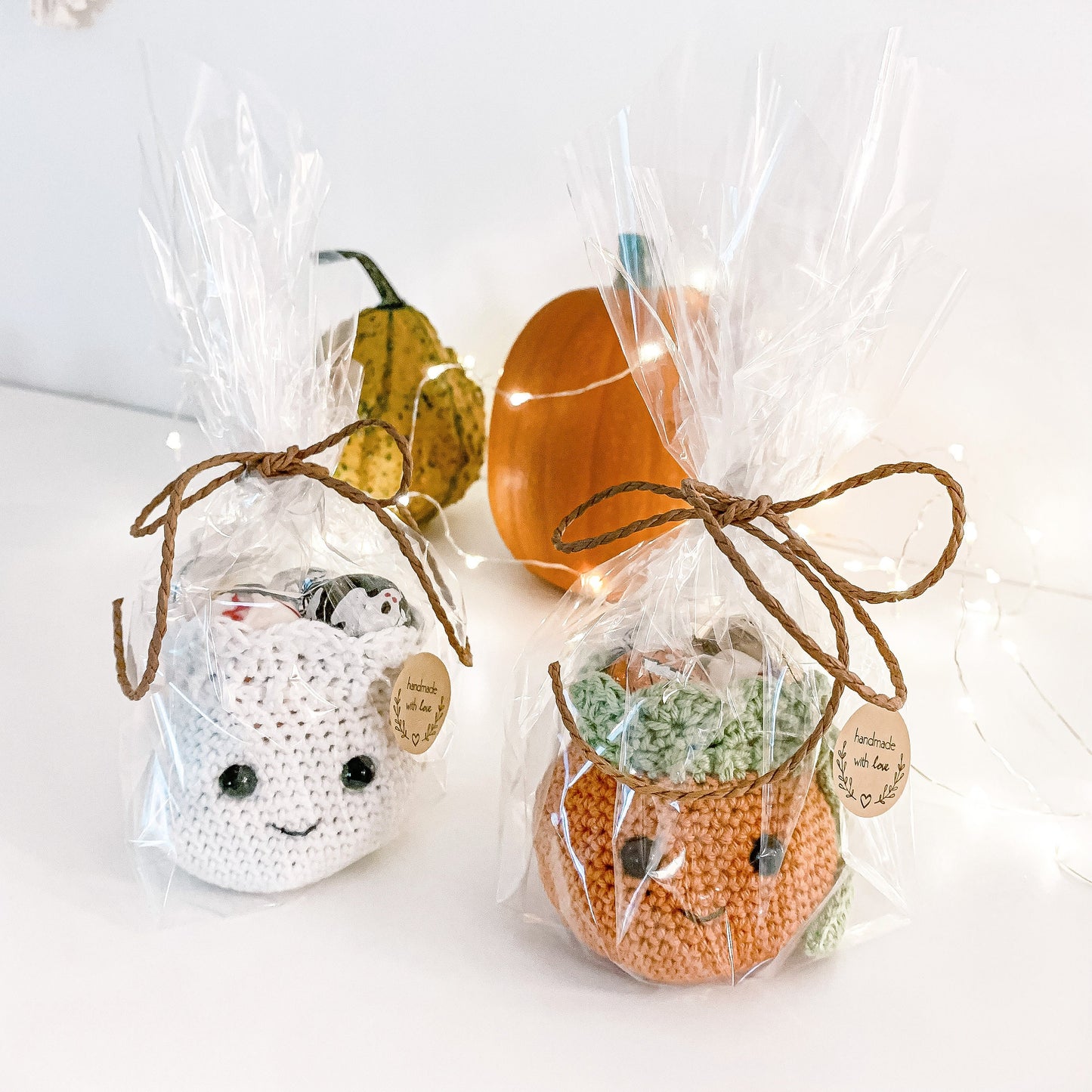 Handmade crochet Halloween decoration pattern featuring a festive gift bag for seasonal celebrations.