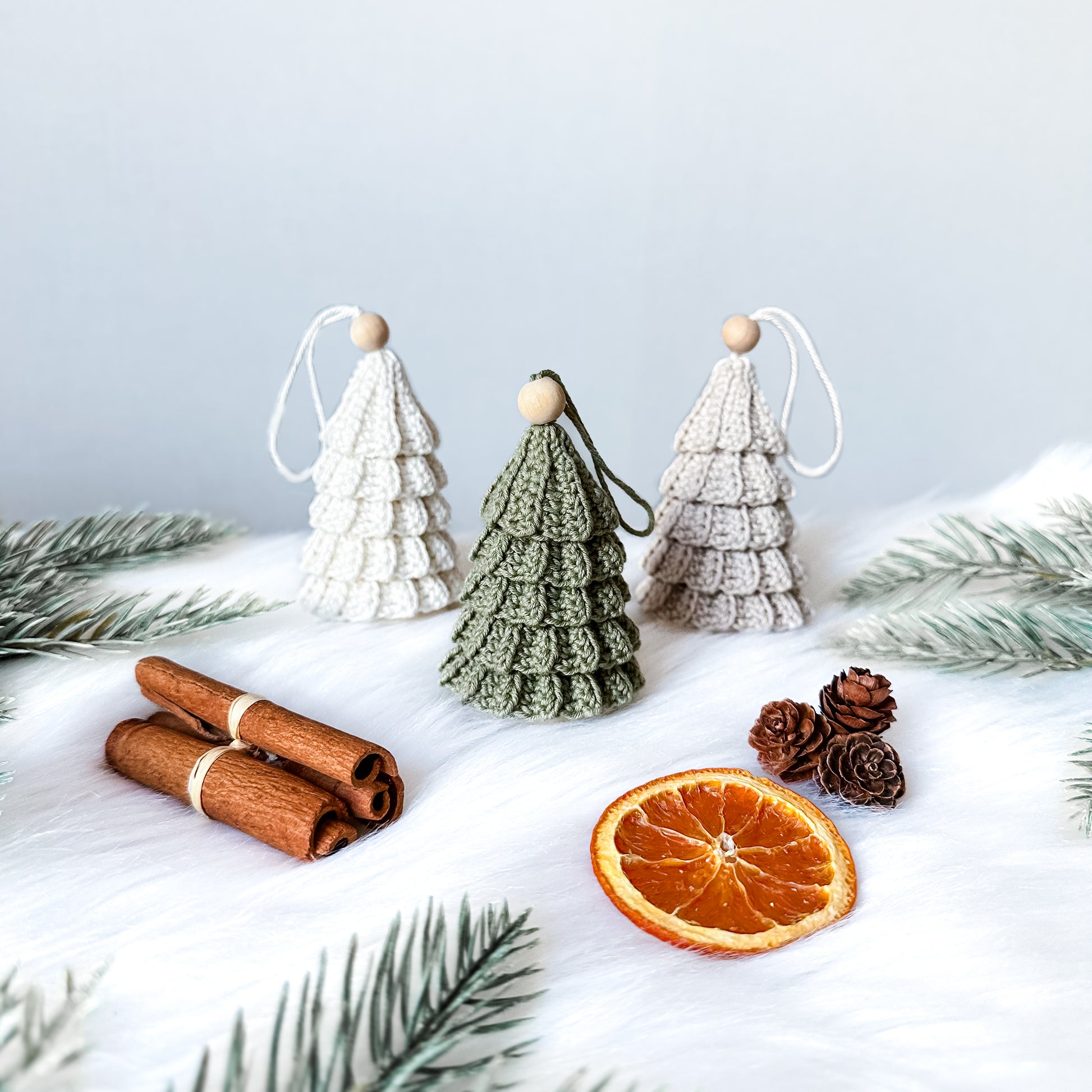 Handmade crochet holiday pattern bundle with modern Christmas ornaments and minimalist Scandinavian styling.