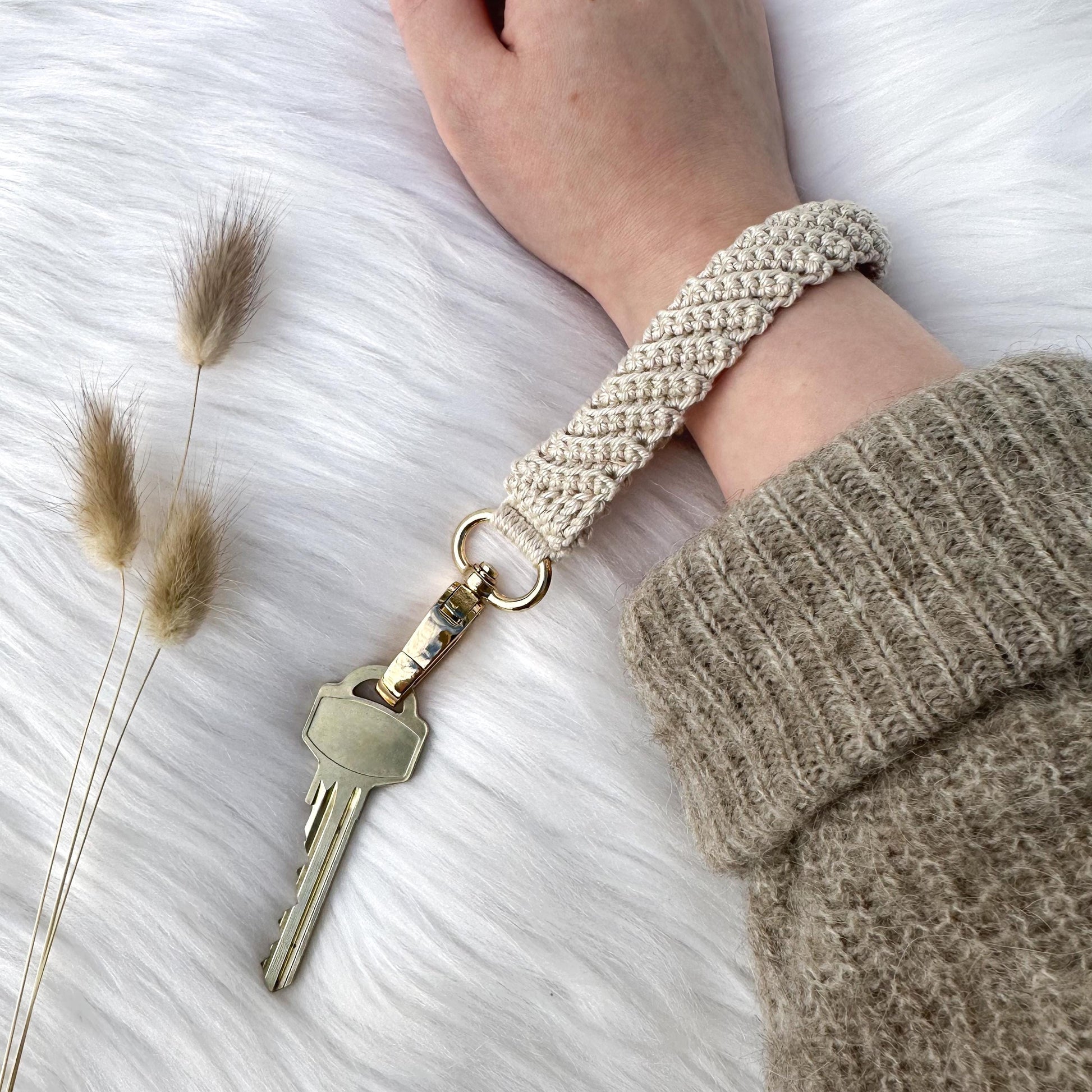 Handmade crochet keychain pattern featuring textured details and modern Scandinavian-inspired styling.