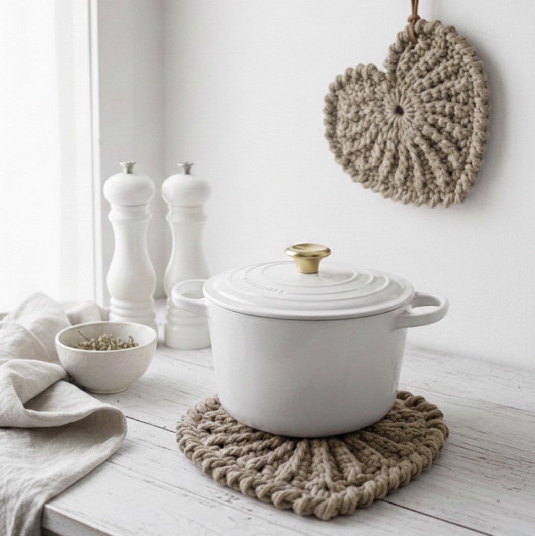 Handmade crochet heart trivet pattern for cozy kitchen styling and modern crochet decor.