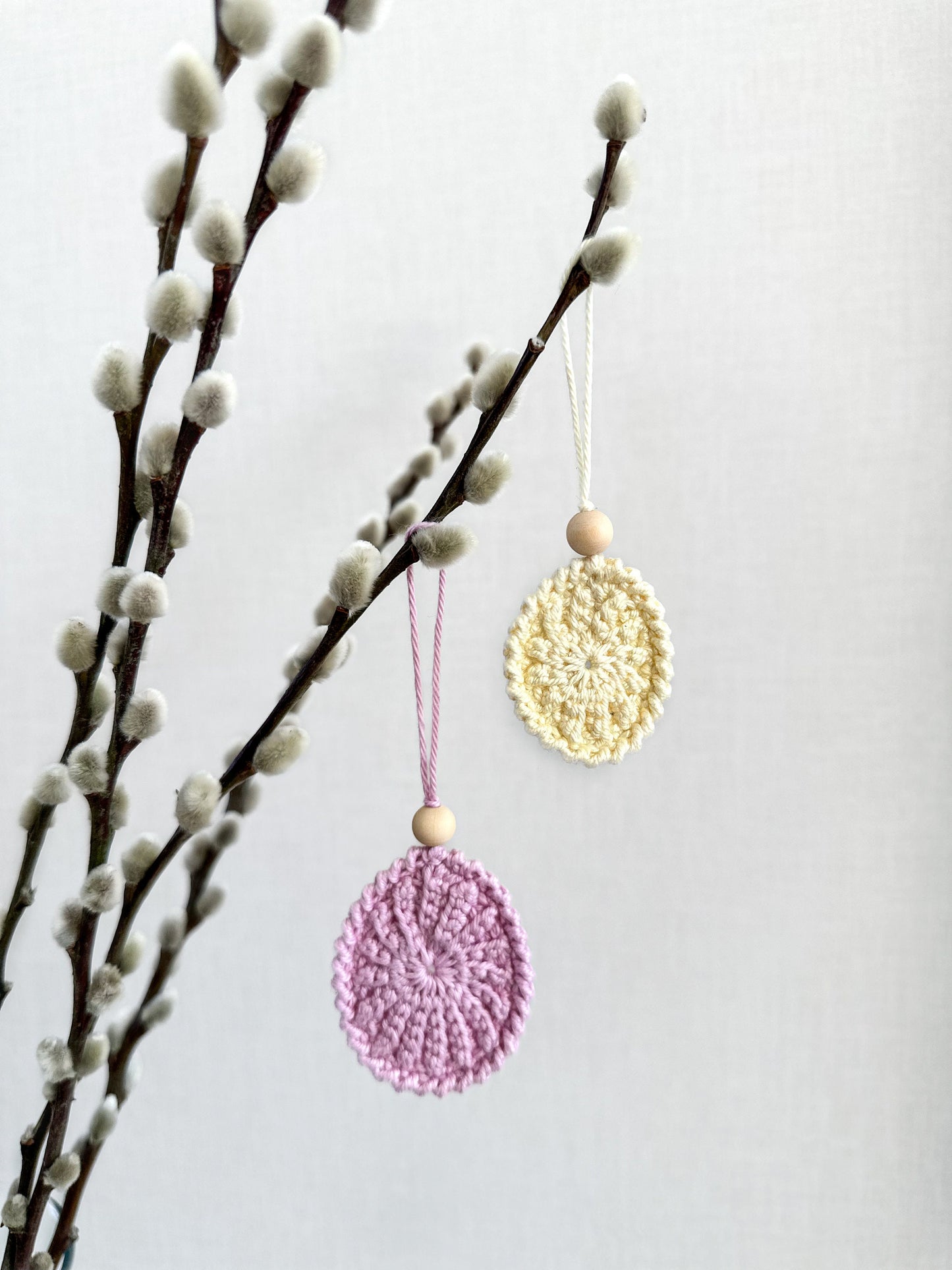 Minimalist crochet Easter decor pattern featuring a handmade egg ornament with modern Scandinavian aesthetic.