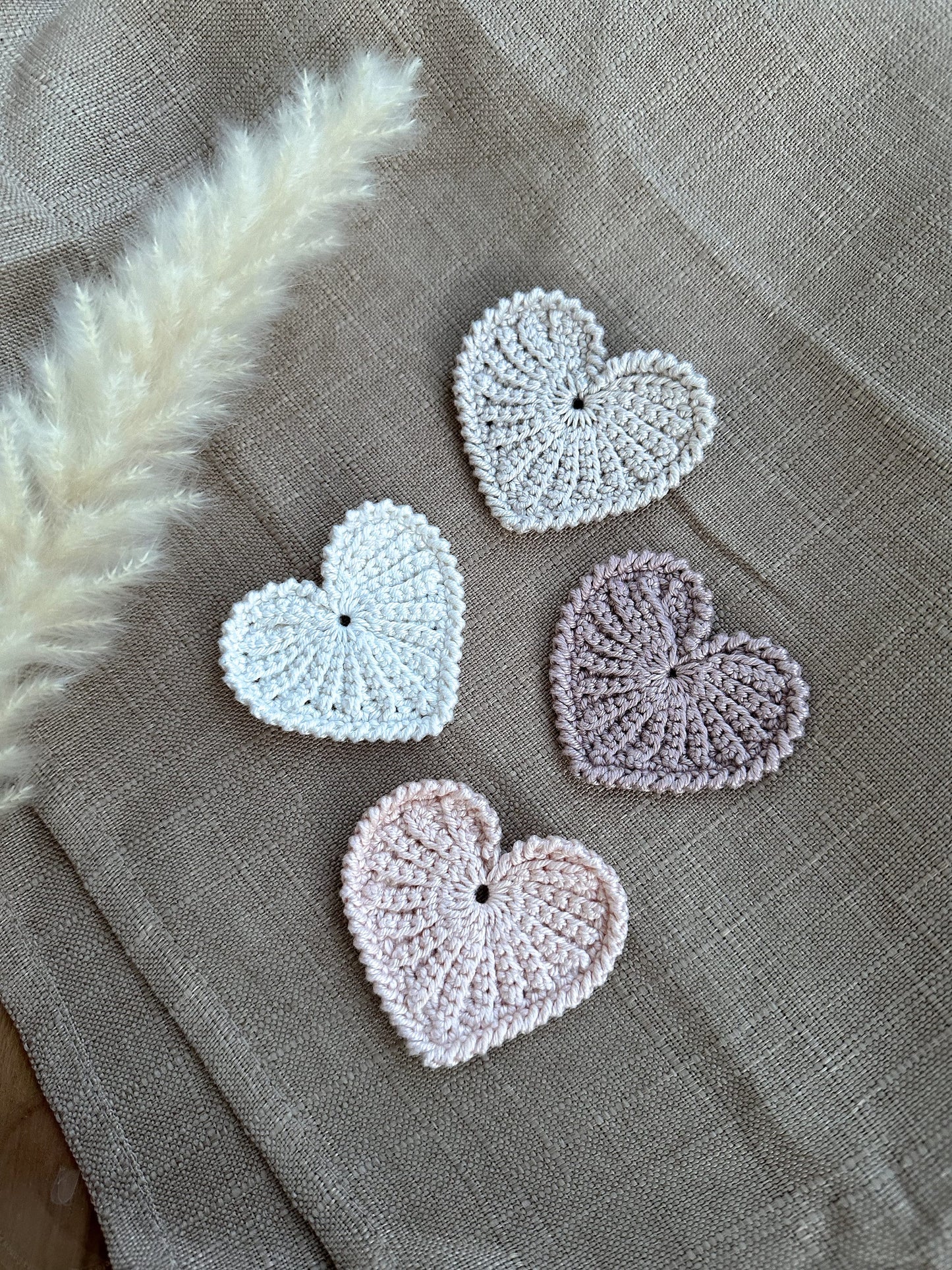 Neutral crochet heart home decor pattern with modern handmade styling and cozy textures.