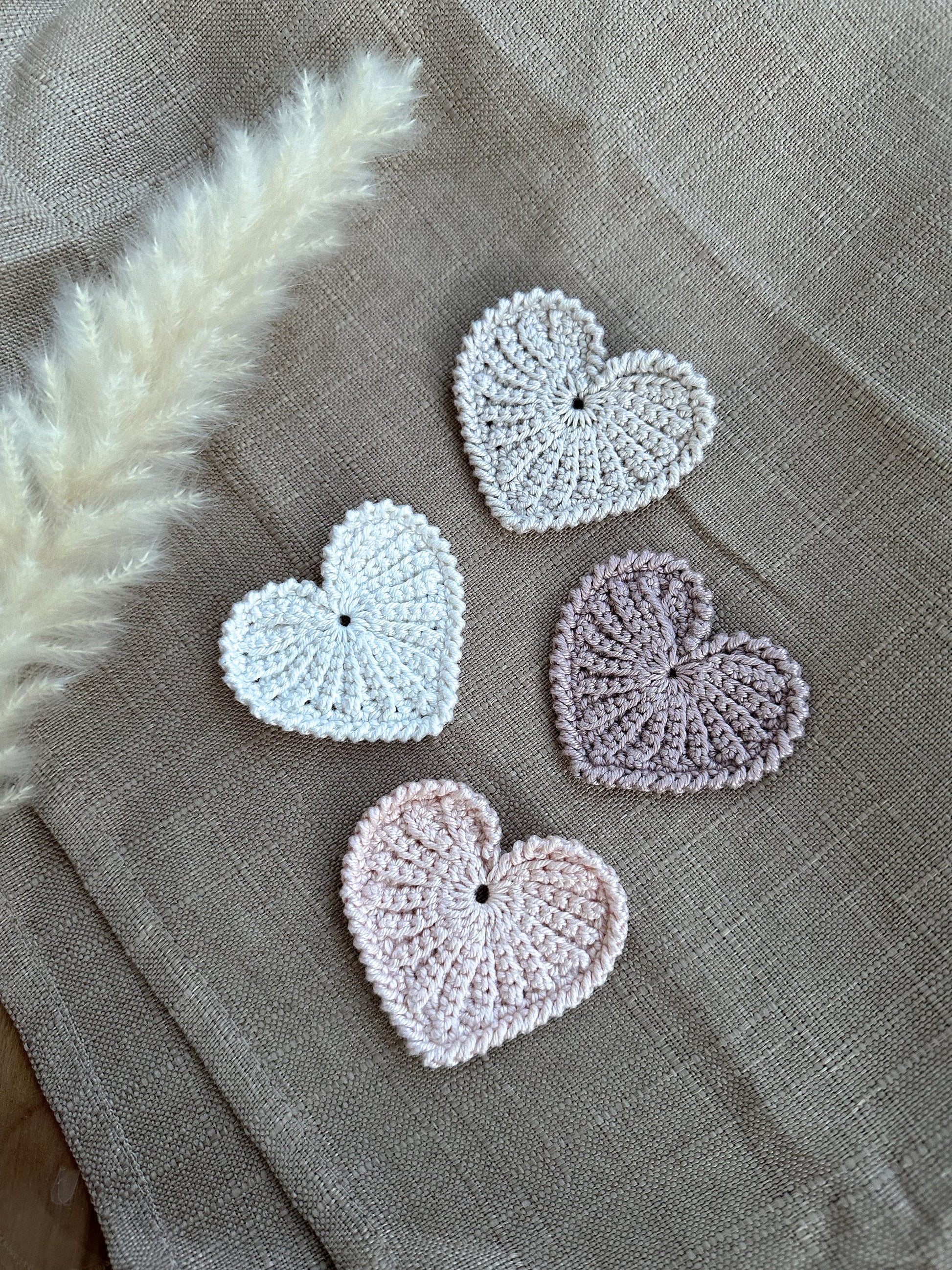Neutral crochet heart home decor pattern with modern handmade styling and cozy textures.