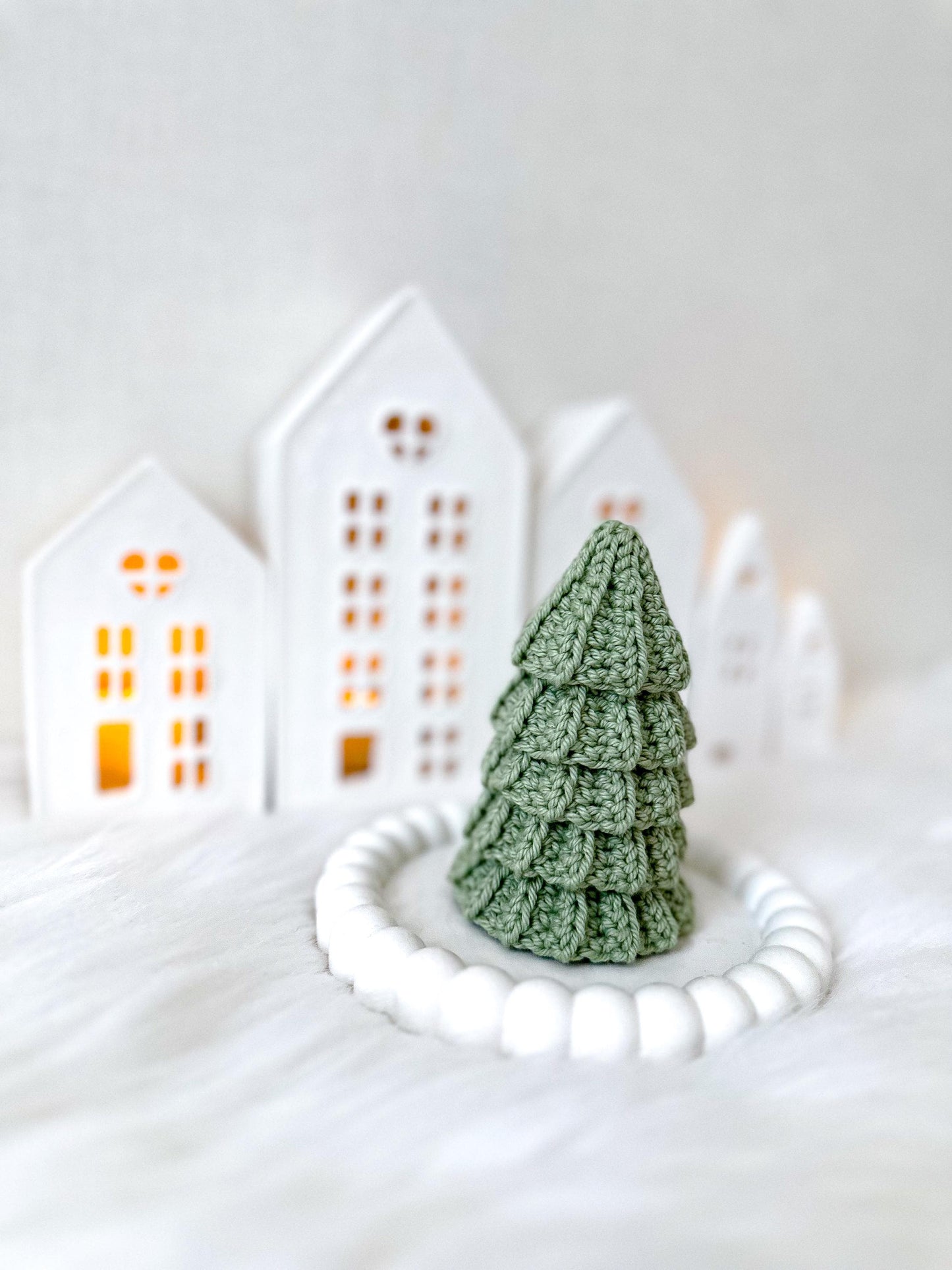 Neutral crochet holiday tree pattern with cozy handmade styling and modern Christmas ornament design.