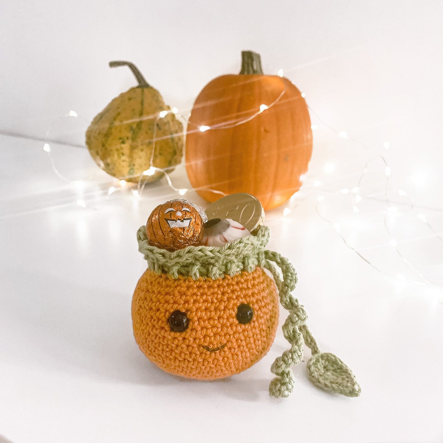 Scandinavian crochet Halloween decor pattern with neutral colors and handmade seasonal aesthetic.