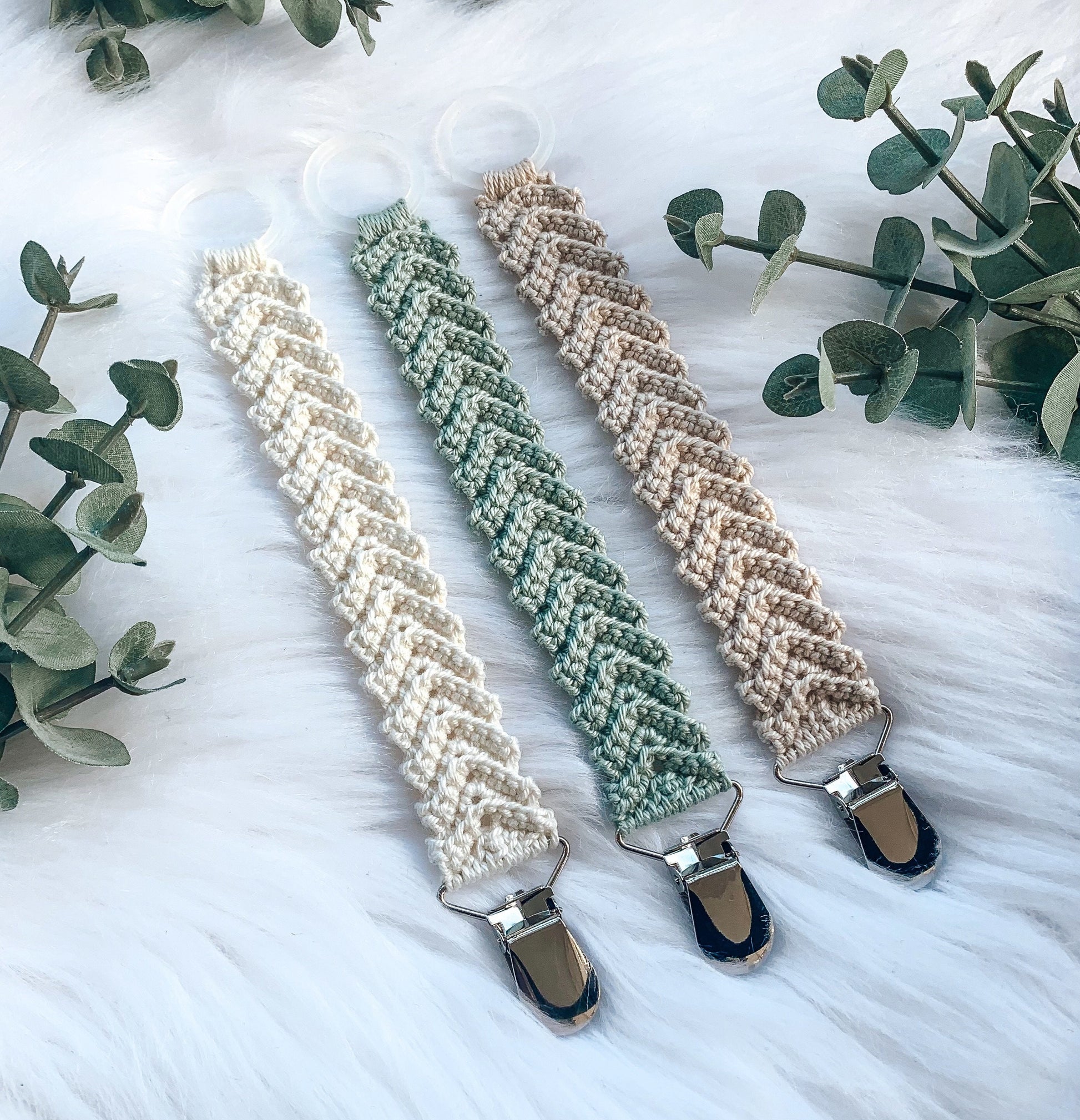Scandinavian crochet pacifier clip pattern with minimalist handmade baby accessory design and timeless styling.