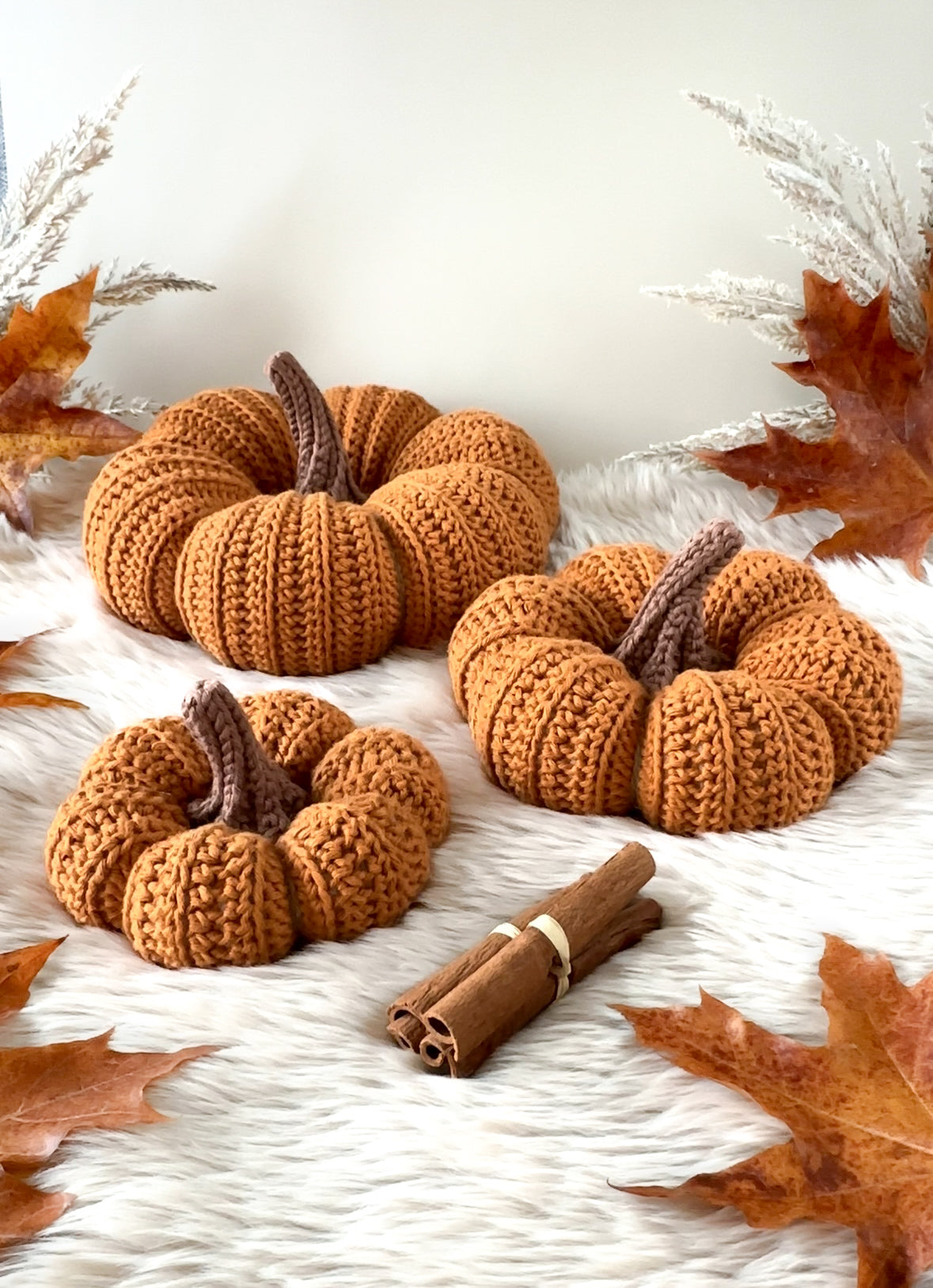Textured crochet pumpkin pattern designed for Scandinavian-inspired autumn home decor